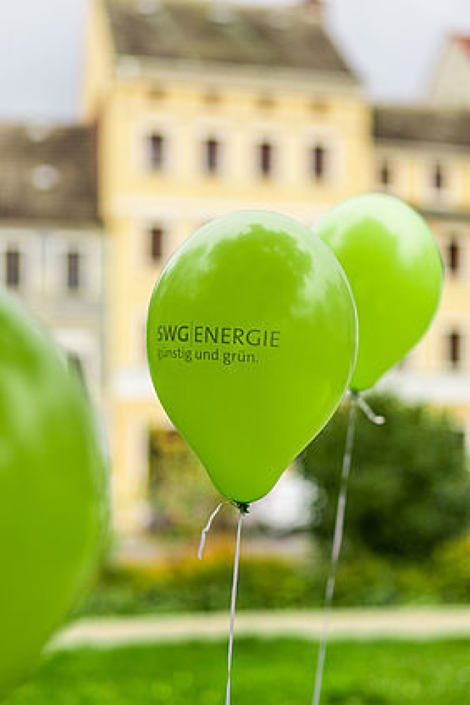 grüne Luftballons mit der Aufschrift SWG | Energie
